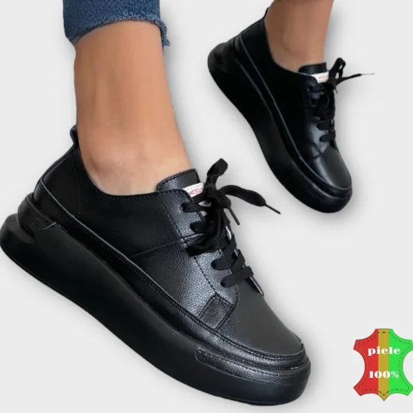 Rövid, fekete, szőrmével bélelt |UGG| típusú természetes velúr csizma platformmal