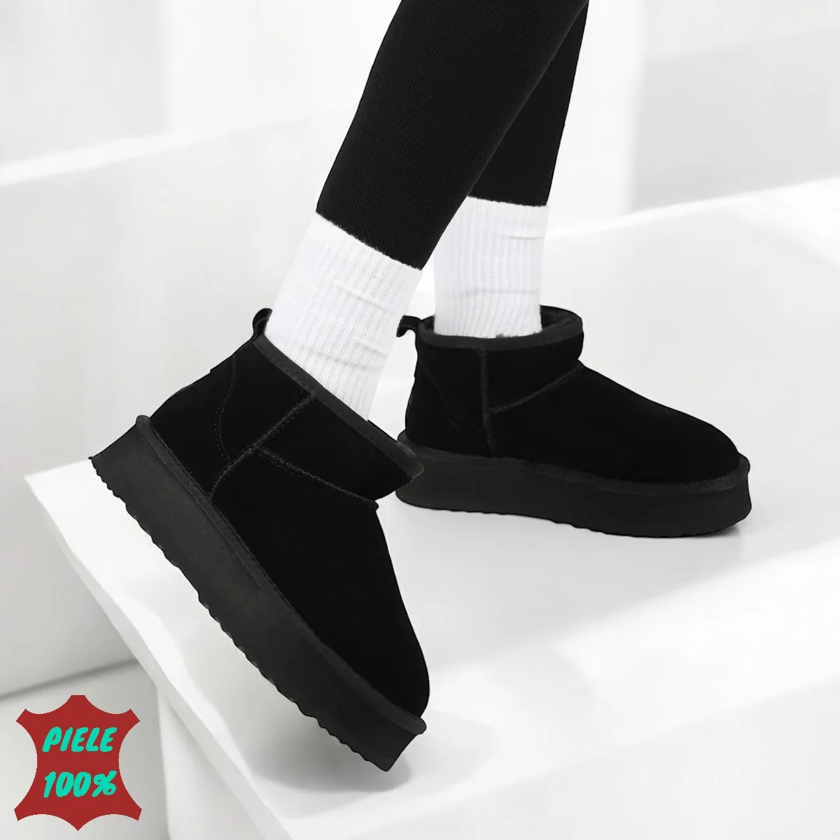 Rövid, fekete, szőrmével bélelt |UGG| típusú természetes velúr csizma platformmal