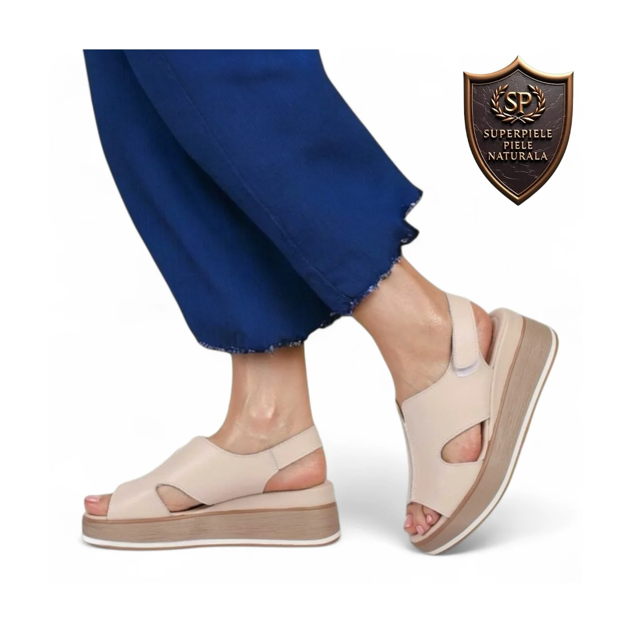 sandalias pantuflasSandalias rosas de mujer fabricadas en piel natural con cierre de velcro y suela de plataforma.