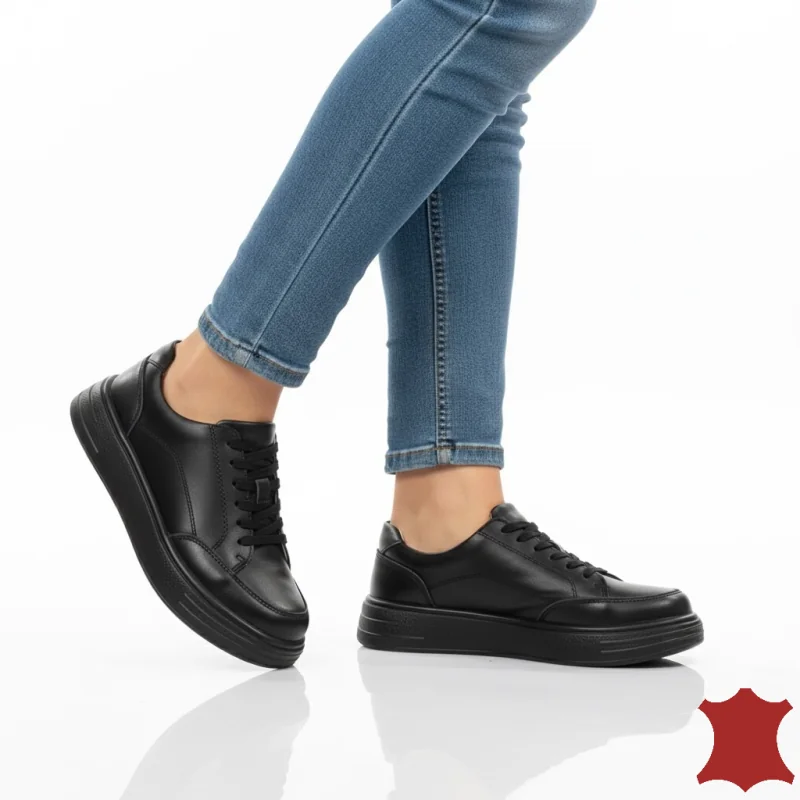 Czarne buty sportowe ze skóry naturalnej, nowoczesne i wygodne, trwała podeszwa